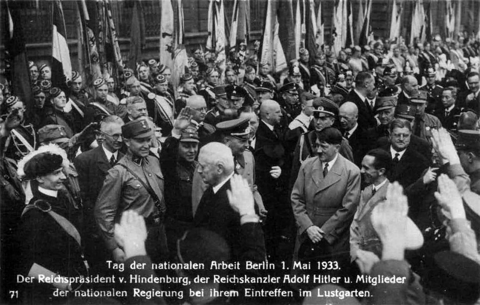 Adolf Hitler and members of the new government walk behind president Hindenburg in Berlin's Lustgarden for the National Labor day celebrations